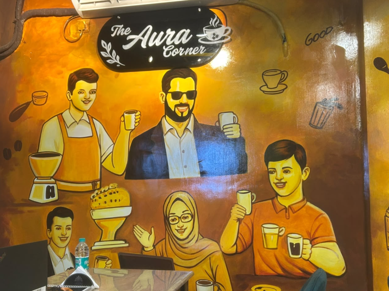 The Aura Corner hand-painted café mural